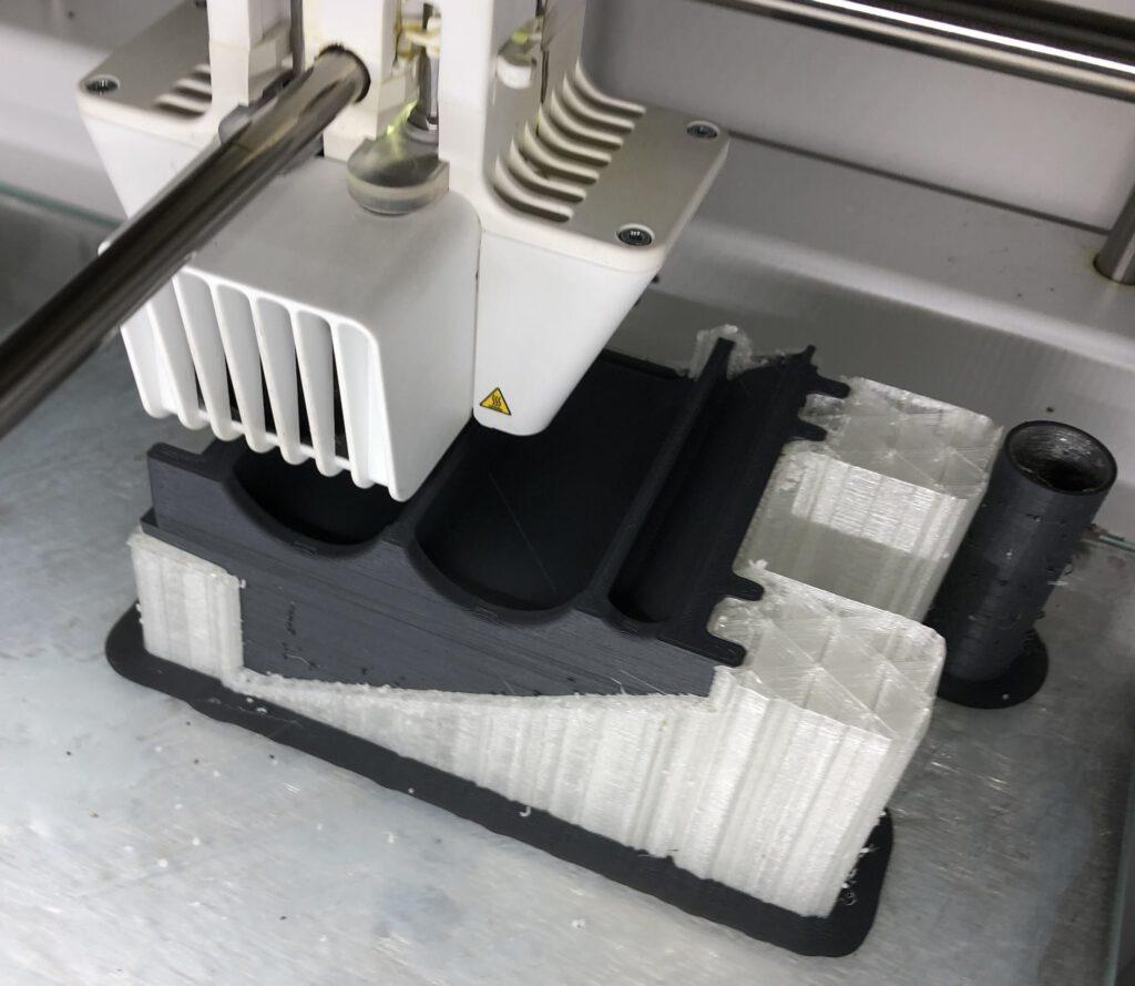 3D printing and early prototype of a medical device.