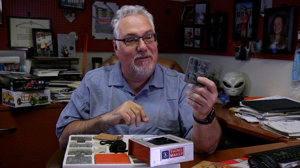 The co-owner of a product development firm sits in his office while discussing what led him to a passion for plastics.