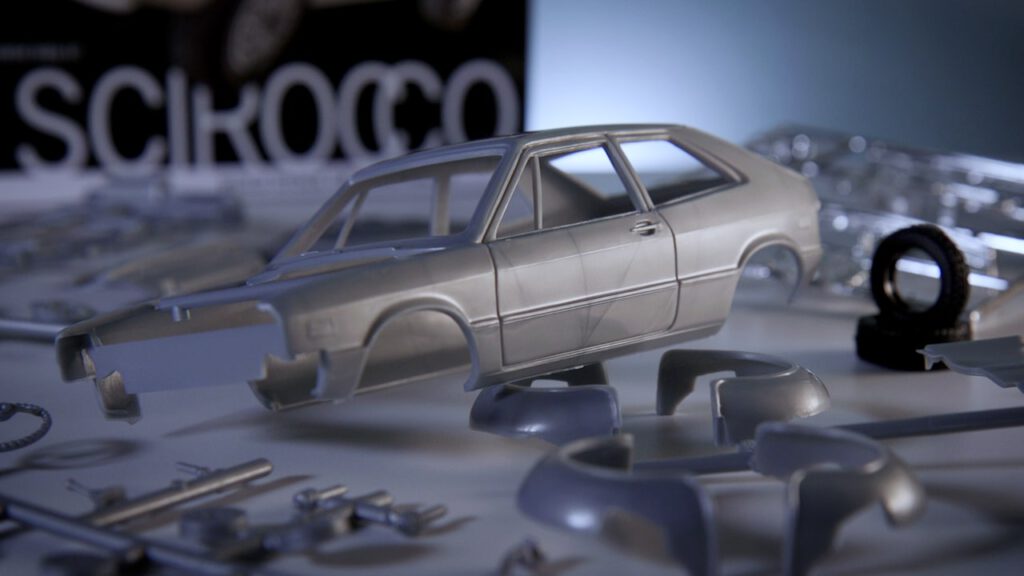 Plastic components of a low-quality model car.