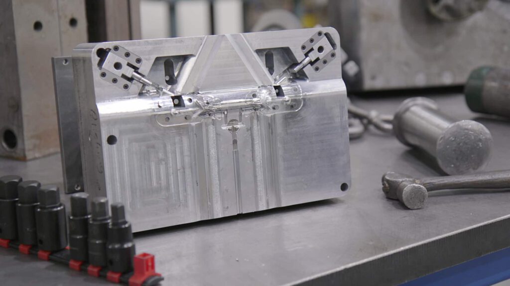 A mold for plastic injection molded components.