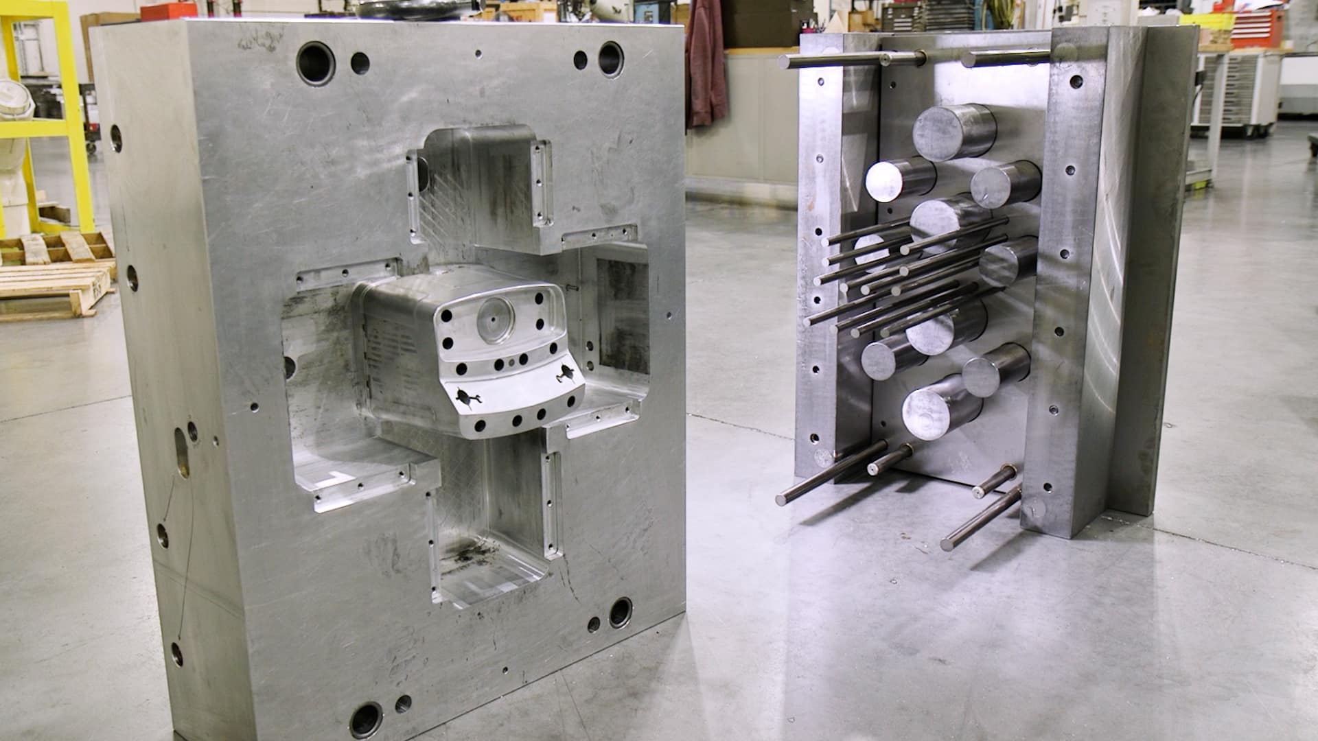 The custom plastic injection mold and base for the top housing of a new medical device.
