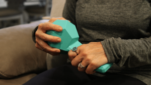 A patient uses the Polyform-1h, a first of it's kind, bi-manual neurorehabilitation device.