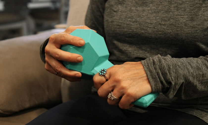 A patient uses the Polyform-1h, a first of it's kind, bi-manual neurorehabilitation device.