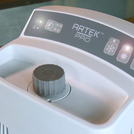 The user interface of a medical device used to reduce swelling. Simple buttons make it easy to operate.