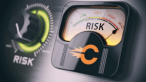 A digitally created image depicting an analog meter which assesses the amount of risk. The needle is pegged in the red.