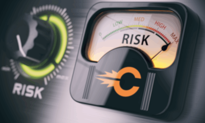 A digitally created image depicting an analog meter which assesses the amount of risk. The needle is pegged in the red.