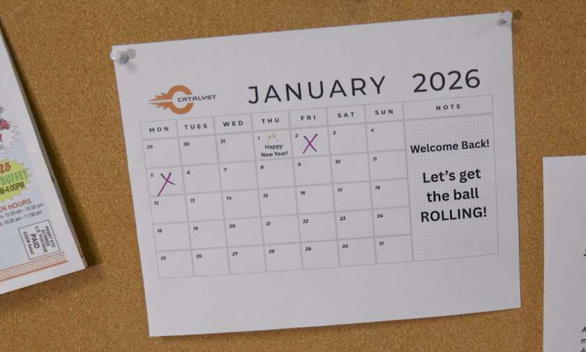 The Holiday Hangover is here. A breakroom calendar is displayed noting that it is January 2026. A note welcomes employees back to work after the holidays. It encourages everyone to get the ball rolling.